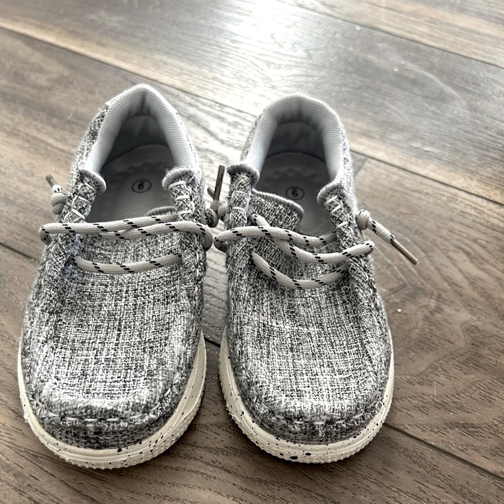 Gray and white toddler boat shoes